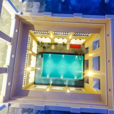 Wide aerial shot of Swimming Pool boutique hotel — one of the best hotels in Udaipur near Lake Pichola, Rajasthan