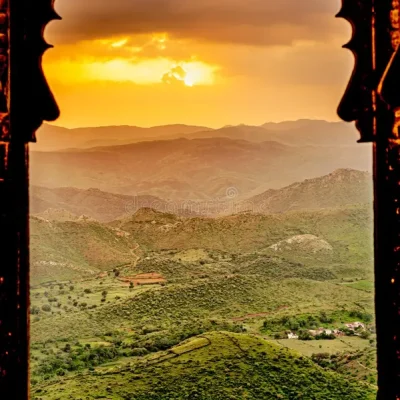 sunset-sajjangarh-fort-udaipur-india-looking-west-setting-sun-monsoon-palace-also-known-as-sajjan-garh-182536096.webp